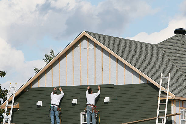 Professional Siding Replacement technician working in Cochranville, PA